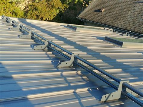 placement snow brackets on metal roof|snow retention screws metal roof.